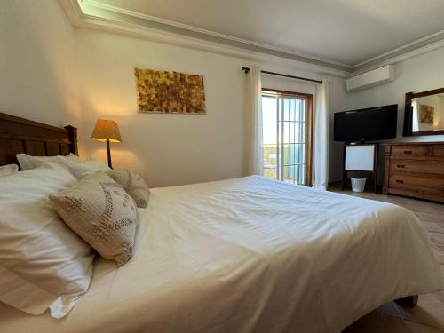 Ένα ή περισσότερα κρεβάτια σε δωμάτιο στο Happy Silva Guesthouse