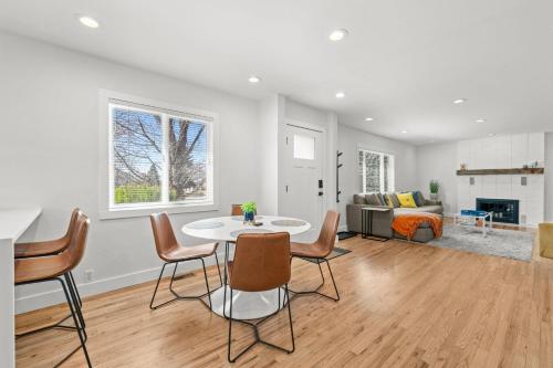 a living room with a table and chairs and a couch at 6224 S Datura St in Littleton