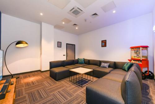 a living room with a couch and a table at Student-Only Accommodations in Belfast in Belfast