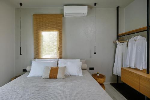 Cama o camas de una habitación en Hermes Residence