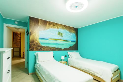 En eller flere senge i et værelse på Bellagio Beautiful Oasi