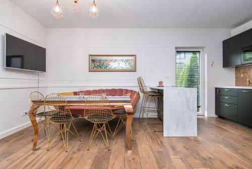 Μια τηλεόραση ή/και κέντρο ψυχαγωγίας στο Apartament Glivia 66B