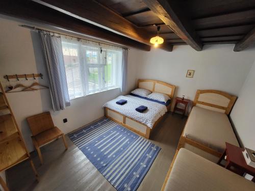 Postel nebo postele na pokoji v ubytování Rozmarýna chalupa Vrbice