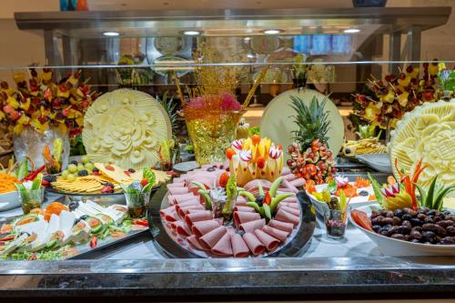 a buffet with many different types of food on a table at Maien Taiba in Al Madinah