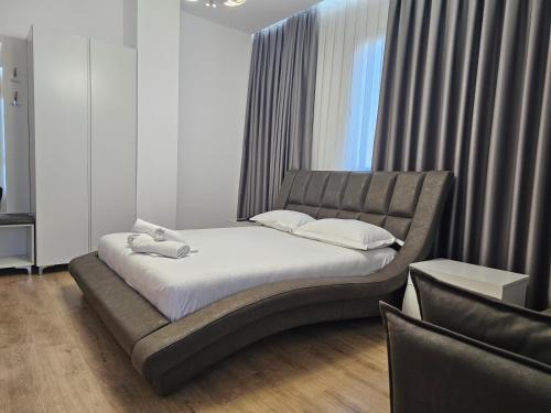 Postel nebo postele na pokoji v ubytování Hotel 3A