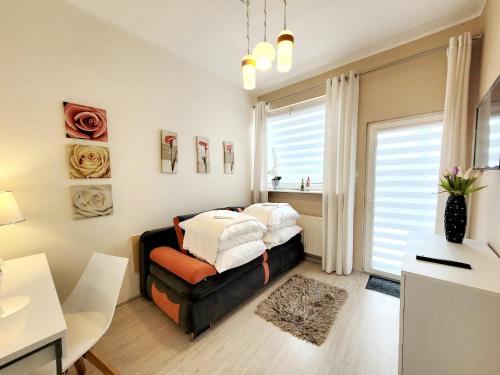 Posteľ alebo postele v izbe v ubytovaní Apartamenty Cudowna Wyspa