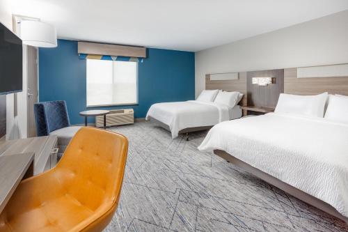 Ένα ή περισσότερα κρεβάτια σε δωμάτιο στο Holiday Inn Express Kearney by IHG