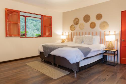En eller flere senger på et rom på La Cabaña Ecohotel - Valle del Cocora