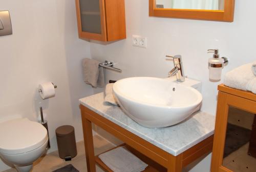 Un baño de Kronsun Percha