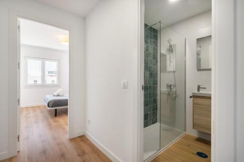 a bathroom with a shower and a sink at dobohomes - Fernandez de los rios in Madrid