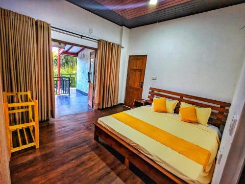 Postel nebo postele na pokoji v ubytování Nelundeniya Resort