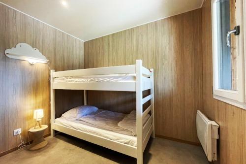 Una cama o camas en una habitación de Lodge Loua