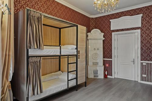 Ένα ή περισσότερα κρεβάτια σε δωμάτιο στο Ramana Garden Hostel - Self-Service Accommodation