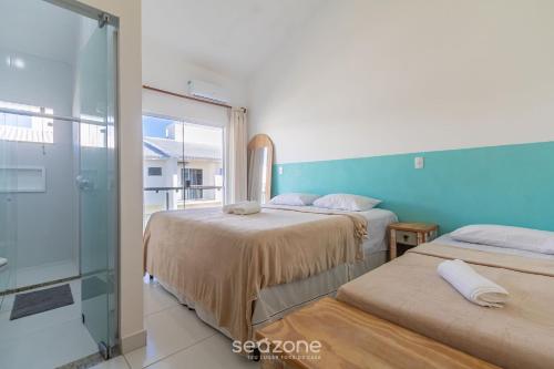 Postel nebo postele na pokoji v ubytování Duplex Elegante c Piscina a 280m da Praia PRM007