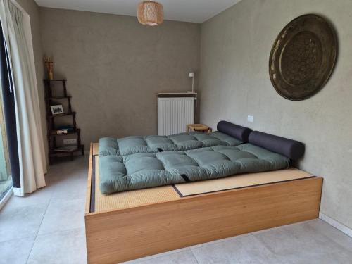 Postel nebo postele na pokoji v ubytování Ryokan met futon