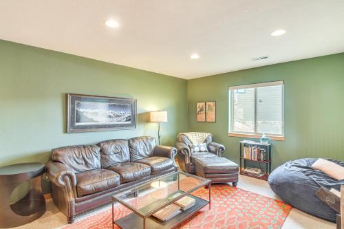 a living room with leather furniture and a couch at 6 Mi to Skiing Mtn-View Fraser Duplex in Fraser