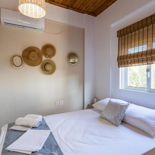 Cama o camas de una habitación en Maisonette with Palms