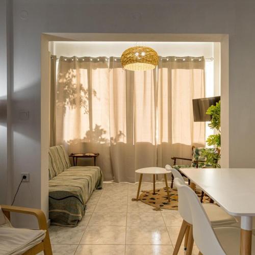Zona de estar de Maisonette with Palms