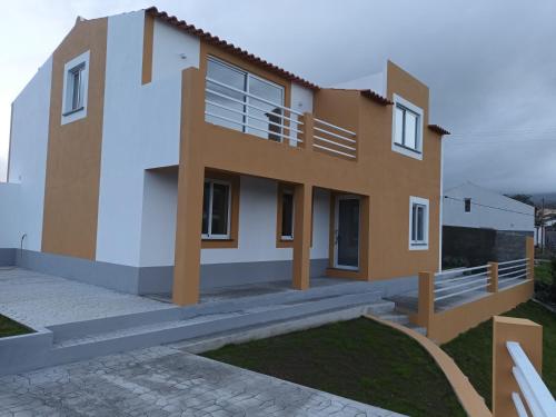 a villa with a view of the ocean at Casa do Capitão-Mor in São Mateus