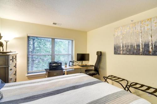 a bedroom with a bed and a desk and a window at River Pines C207 condo in Edwards