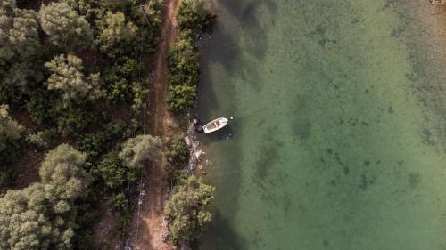 an aerial view of a boat in a body of water at Country House Hortensia in Spárton