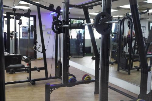 a gym with a bunch of machines at LANDSCAPE SOLAR - Beira Mar de Fortaleza in Fortaleza