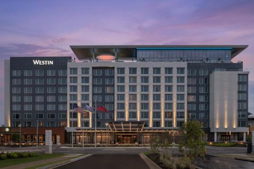 a rendering of a westin hotel at dusk at The Westin Atlanta Gwinnett in Duluth
