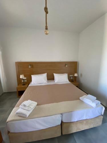 Postel nebo postele na pokoji v ubytování Karras Village