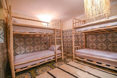 Postel nebo postele na pokoji v ubytování Oasis Medina Hostel