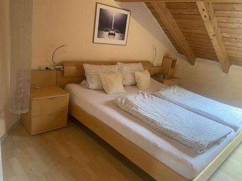 Postel nebo postele na pokoji v ubytování Penthouse in Ostseebad Sierksdorf