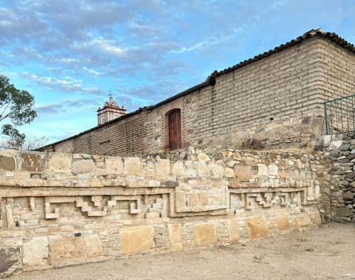 a brick wall with a window on top of it at Casa Elim-Oaxaca in Teotitlán del Valle