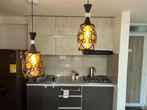 Η κουζίνα ή μικρή κουζίνα στο Lindo y disponible Apartamento camino a termales