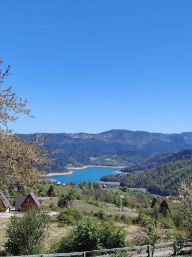 a view of a lake from a hill at Aurora Tara 2 in Jezdići