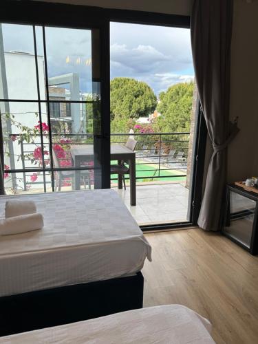 Katil atau katil-katil dalam bilik di Malta Hotel Bodrum