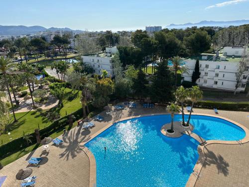 an overhead view of a swimming pool at a resort at Family Relax Apartment in Alcudia