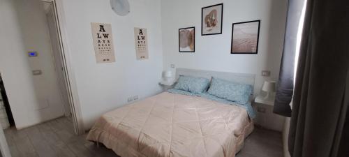 Postel nebo postele na pokoji v ubytování Cascina Boroardo D4