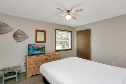 Seas of Jade by Pristine Properties Vacation Rentalsにあるベッド