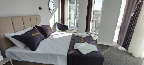 Ένα ή περισσότερα κρεβάτια σε δωμάτιο στο Cevvo Hotel Pendik