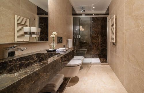 Ett badrum på WorldHotel Casati 18