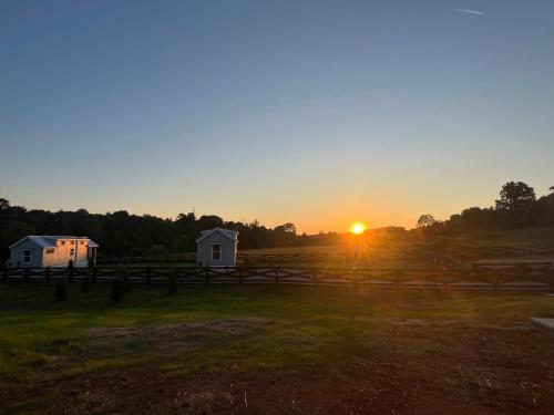 Amanecer o atardecer desde la casa vacacional o alrededores