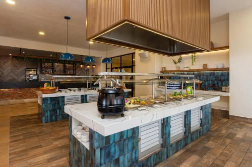 Dapur atau dapur kecil di Tesoro Ixtapa All Inclusive
