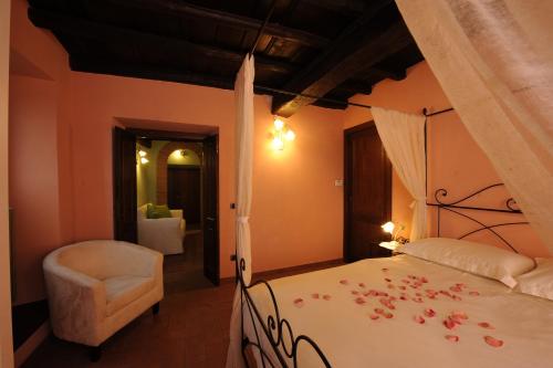 Katil atau katil-katil dalam bilik di La Scaletta Holiday House