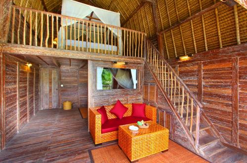 Posezení v ubytování De Klumpu Bali Eco Tradi Stay
