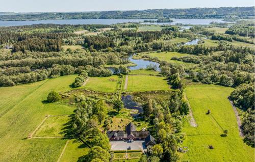an aerial view of a large estate with a river at Awesome Home In Ry With Kitchen in Ry