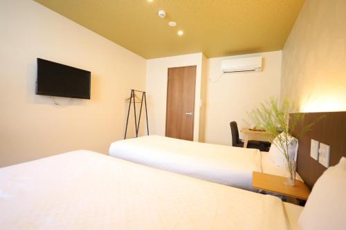 HOTEL THE POINT 清水五条にあるテレビまたはエンターテインメントセンター