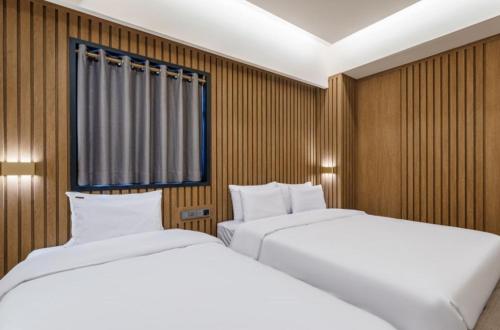 Letto o letti in una camera di Yeonggwang Hound Hotel