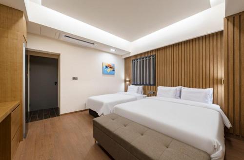 Letto o letti in una camera di Yeonggwang Hound Hotel