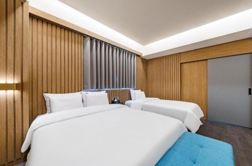 Letto o letti in una camera di Yeonggwang Hound Hotel