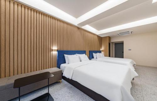 Letto o letti in una camera di Yeonggwang Hound Hotel