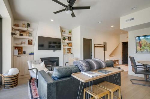 a living room with a couch and a table at Alpine Mountain Escape in Beaver
